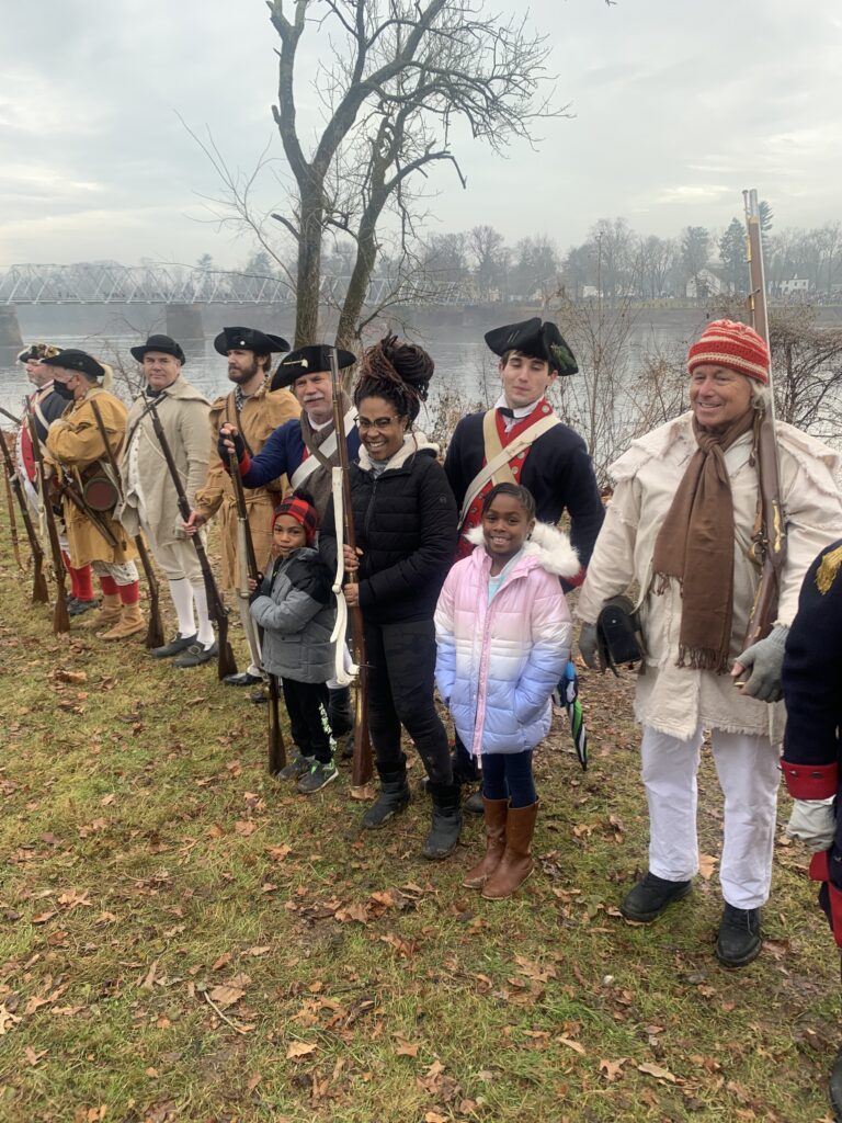 Taking a picture with actors of the Washington Crossing reenactment 